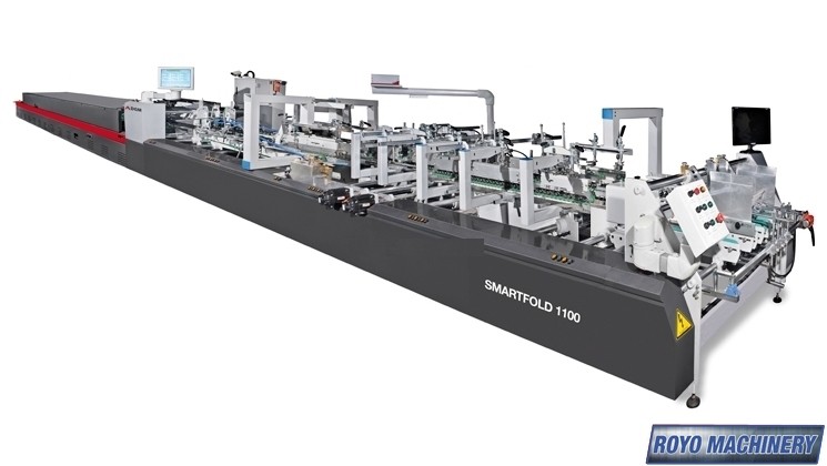 Successful machine test - Specialty double partition box being glued in Ecuador